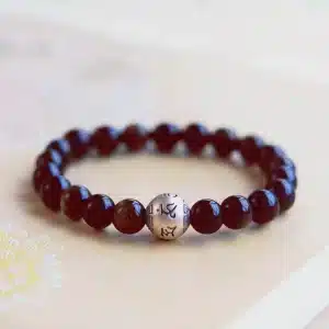 an amage of Obsidian Bracelet with Sterling Silver Mantra Bead