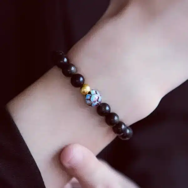 Black Obsidian Bracelet – Lotus Bead with Gold Accent, Elegant Unisex Jewelry - Image 5