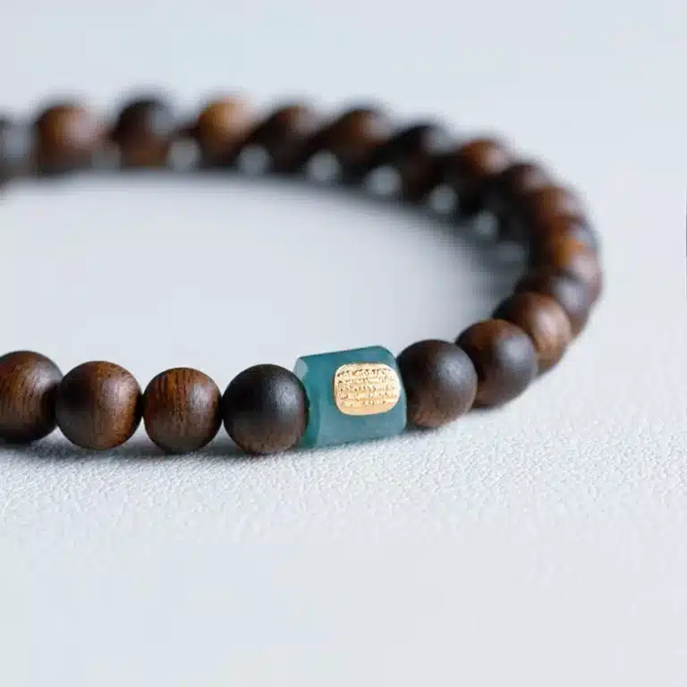 an amage of Sandalwood Bracelet with Blue Jade Barrel Bead