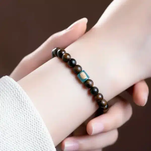 Sandalwood Bracelet with Blue Jade Barrel Bead & Gold-Plated Silver Inlay - Image 6